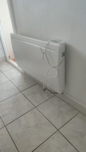 Photo de galerie - Pose de radiateurs électriques.