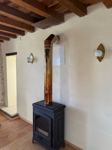 Photo de galerie - Mise en coformite conduit , tubage inox, création de trappe accès , installation poêle Godin 