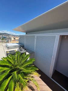 Photo de galerie - Grille à ventelle pour cacher les Clim