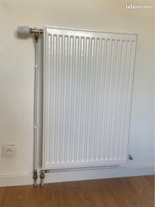 Photo de galerie - Pose radiateur sur le chauffage 