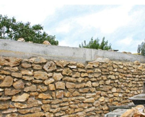 Photo de galerie - Recouvrement d'un Murs en parpin en vieilles pierre