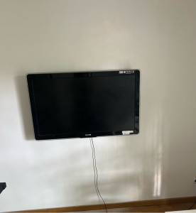 Photo de galerie - Fixation d’une télévision au mur 