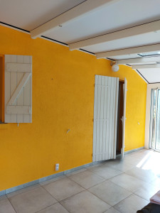 Photo de galerie - Véranda Après 
Traitement des fissures + mise en peinture orange de cette véranda qui apporte une touche de  