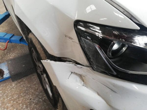 Photo de galerie - Réparation de bosse latérale Audi 3