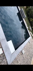 Photo de galerie - Pose margelles piscine en grès Céram
