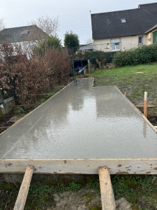 Photo de galerie - Réalisation d’une dalle béton 