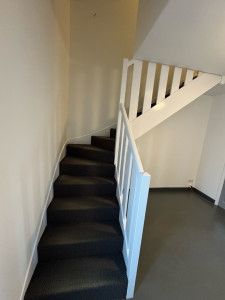 Photo de galerie - Peinture d’une balustrade.