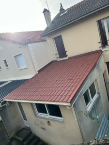 Photo de galerie - Remplacement d’une toiture par taule bac, acier, imitation Tuile