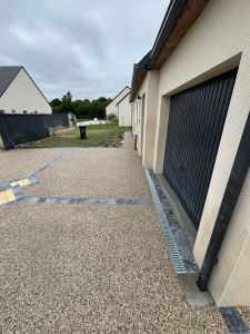 Photo de galerie - Allée de garage en désactivé avec motif losange pavé 