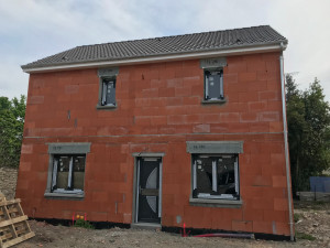 Photo de galerie - Construction d'une maison individuelle
Maconnerie
Charpente Couverture 
Menuiseries extérieures
