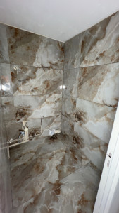 Photo de galerie - Rénovation complète des toilettes et pose de carrelage en 120 x 60 