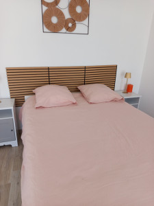 Photo de galerie - Lit fait dans une rbnb drap housse plus housse de couette plus taies d'oreillers 
