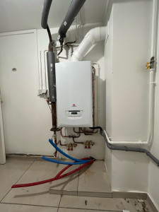 Photo de galerie - Remplacement chaudière à condensation avec pose de nourrice chauffage 