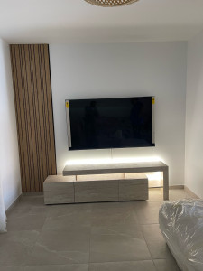 Photo de galerie - Installation et  décoration meuble tv