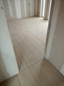 Photo de galerie - Réalisation d’une maison en imitation parquet 