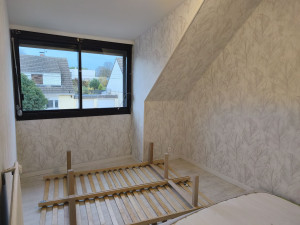 Photo de galerie - Pose d'un papier peint avec raccords 