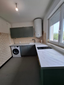 Photo de galerie - Pose cuisine avec branchement d'électroménager et modification d'arriver et évacuation des eaux 