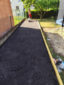 Photo de galerie - Réalisation d'un terrain de pétanque.