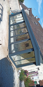 Photo de galerie - Pose d'une veranda Aluminium toiture simple pente