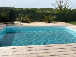 Photo de galerie - Construction complète en maçonnerie, PVC armé ,filtration et terrasse en bois