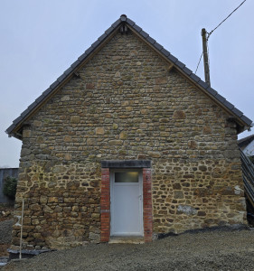 Photo de galerie - Maçonnerie d'un pignon en pierre 