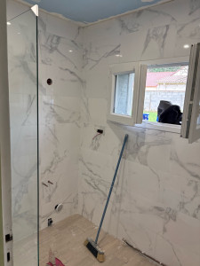 Photo de galerie - Rénovation de salle de bain, carrelage plomberie