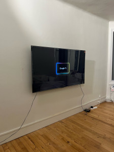 Photo de galerie - Pose d’un téléviseur au mur avec support mural 