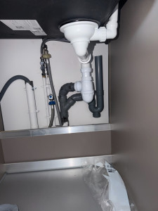 Photo de galerie - Piquage sur évacuation et mise en place d’un shiphon pour machine à laver 