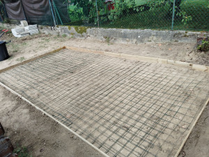 Photo de galerie - Création d' une dalle béton pour abris de jardin 