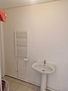 Photo de galerie - Enduit finition salle de bain suite 