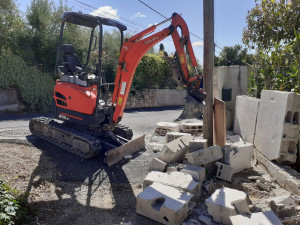 Photo de galerie - Démolition à l'engin mécanique.