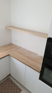 Photo de galerie - Cuisine - Après 
Découpe sur-mesure et installation étagère