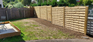 Photo de galerie - Clôture panneaux bois