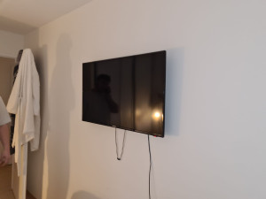 Photo de galerie - Pose d'un support mural pour tv