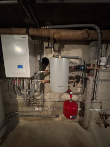 Photo de galerie - Installation d’une pompe à chaleur aire eau 