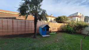 Photo de galerie - Clôture en Douglas à claire voie 