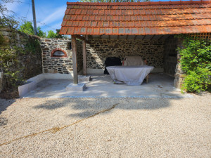 Photo de galerie - Cuisine extérieure 
Terrassement, Joints et Dalles 