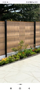 Photo de galerie - Pose de grillage rigide avec lamelle brise vue