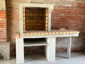 Photo de galerie - Barbecue d’intérieur avec colonne de cheminée 