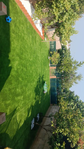 Photo de galerie - Pose d'un gazon synthétique 