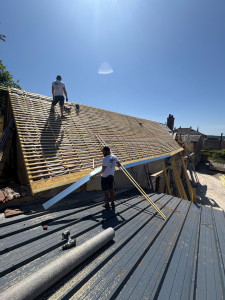 Photo de galerie - Mise en place d’un écran sous toiture du lattages et dégoûté