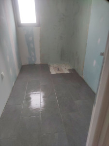 Photo de galerie - Pose de carrelage au sol 