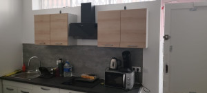 Photo de galerie - Montage et pose meuble cuisine complète le plan de travail et plomberie et électricité aussi tout nickel 