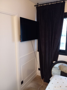 Photo de galerie - Fixation support TV 