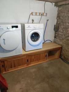 Photo de galerie - Aménagement buanderie avec meuble bas