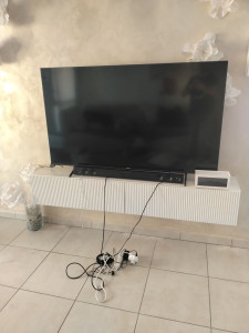 Photo de galerie - Montage et fixation meuble tv