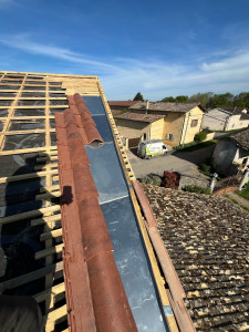 Photo de galerie - Réalisation d’un couloir à redan sur tuile mécanique