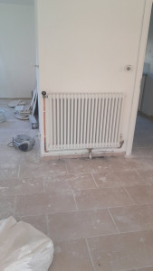 Photo de galerie - Remplacement radiateur par un radiateur design avec modification alimentation cuivre et multicouche.