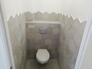 Photo de galerie - Création d'un toilette avec WC suspendu plus carrelage 