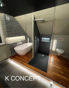 Photo de galerie - Une salle de bain moderne et épurée, réalisée avec des finitions soignées.